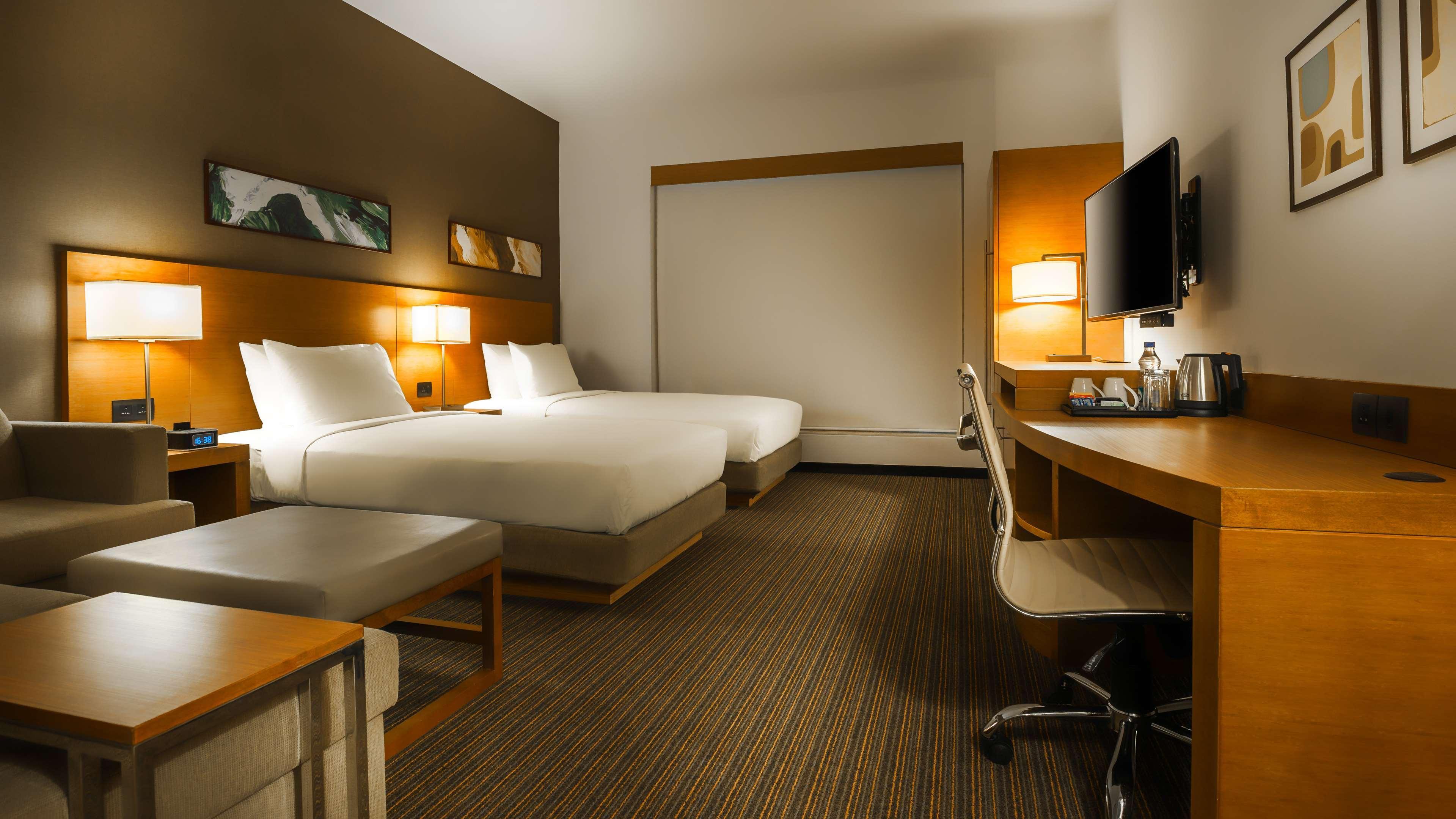 Hyatt Place Gurgaon Udyog Vihar Exteriér fotografie A typical room at the Holiday Inn Express